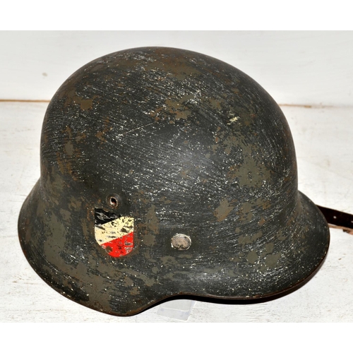 591 - A WW2 German Double Decal helmet with original 1938 ink stamp on liner