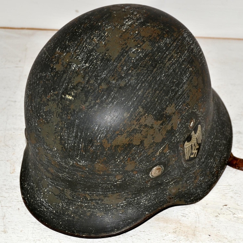 591 - A WW2 German Double Decal helmet with original 1938 ink stamp on liner