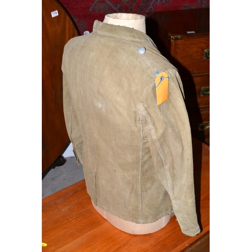 597 - A WW2 period German Prisoner of War Afrika Korps tunic - with original eagle later added for display