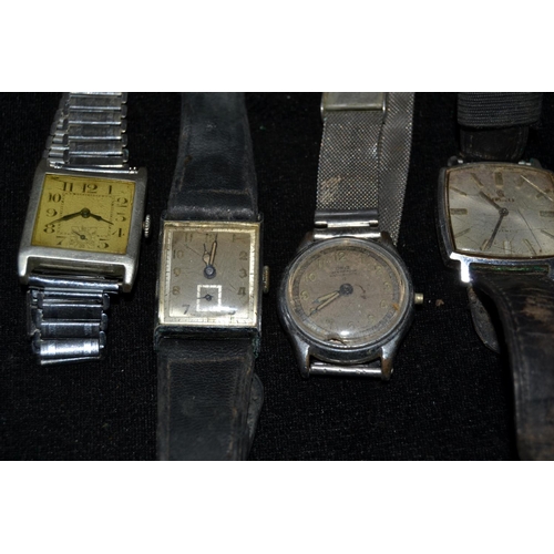 711 - 5 vintage watches for spares - one silver cased