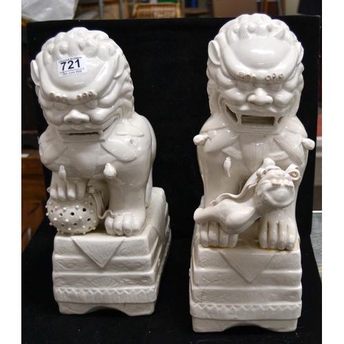 721 - A pair of large Chinese Blanc de Chine Dog of Fo or Temple Dog figures