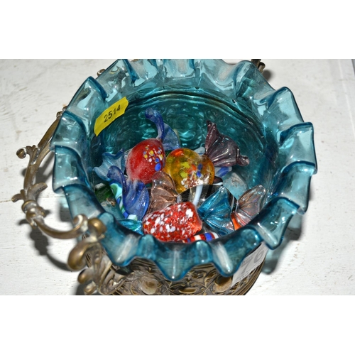 765 - An antique silver plated dish with frilled glass liner containing glass sweets