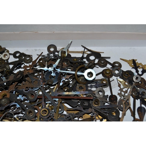 808 - A large qty of antique clock hands to inc blued steel examples