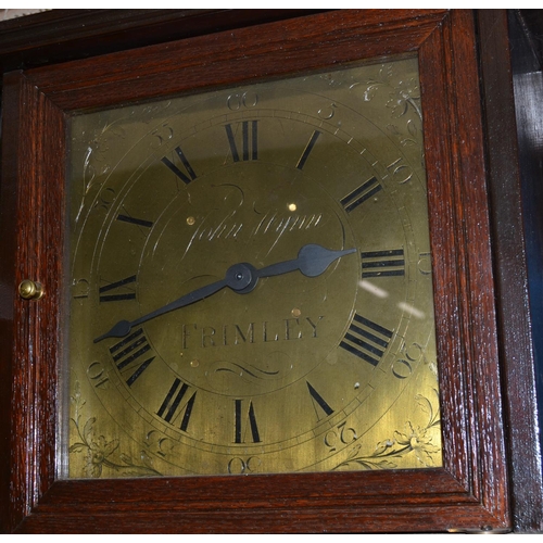 844a - A vintage grandfather clock with brass dial