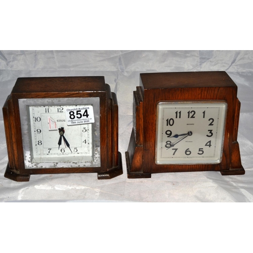 854 - 4 wooden cased clocks