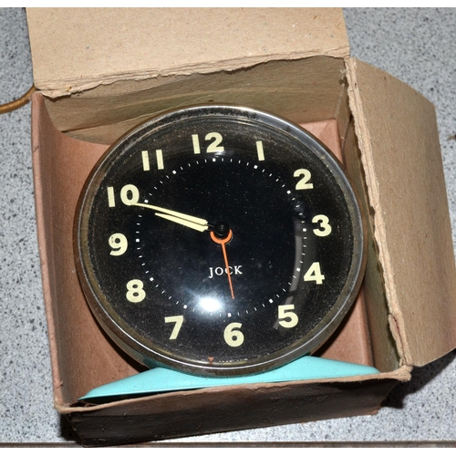 856 - A Smiths Melotic alarm clock in box and 2 boxed Jock alarm clocks