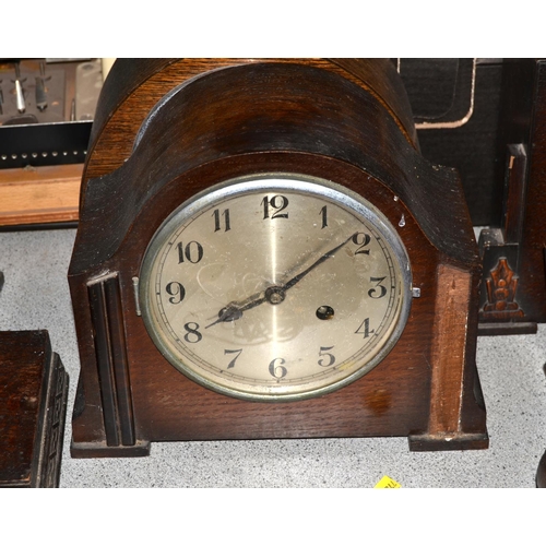 857 - 3 wooden cased mantle clocks