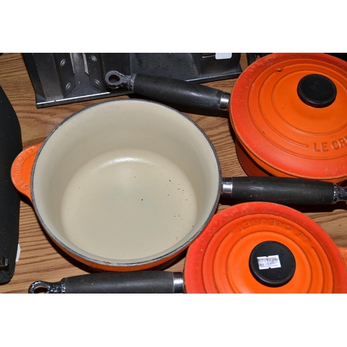 896 - A set of 3 Le Creuset saucepans