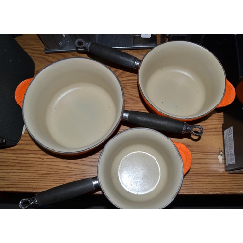 896 - A set of 3 Le Creuset saucepans