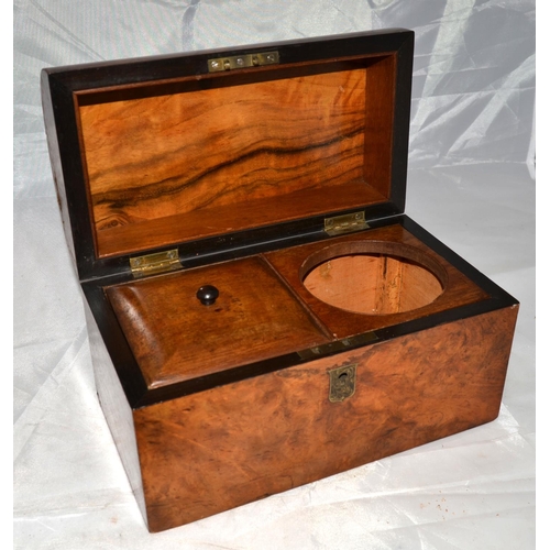 989 - An antique Walnut dome topped tea caddy