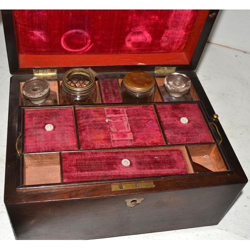 20 - An antique Rosewood jewellery and vanity box with fitted interior