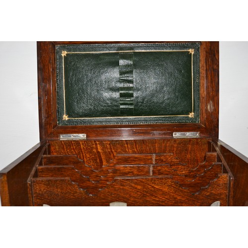 25 - A vintage oak stationary box with leather interior