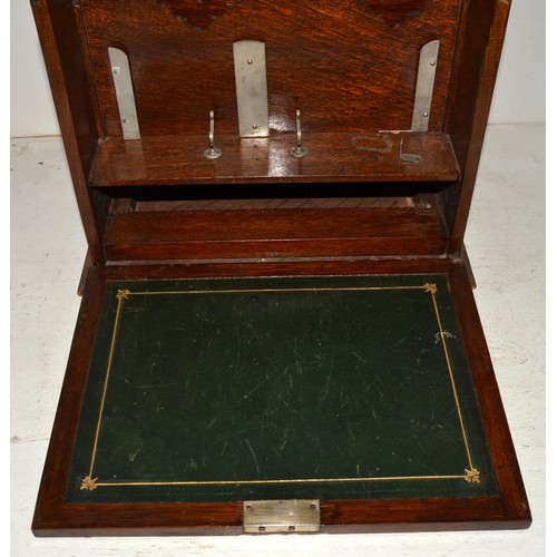 25 - A vintage oak stationary box with leather interior