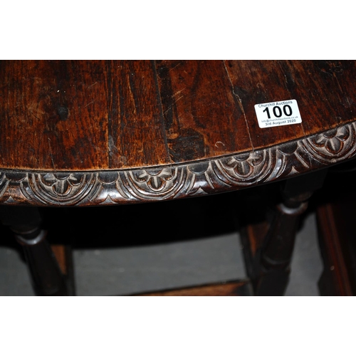 100 - Antique carved Oak drop leaf table