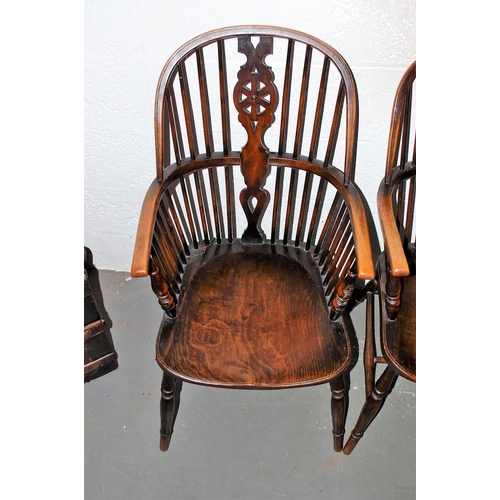 131a - A pair of antique Elm seated wheel back country armchairs