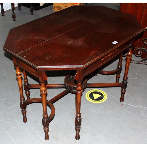 134 - An unusual inlaid Mahogany table with gallery base