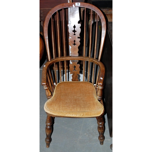 14 - Antique elm seated high backed country armchair