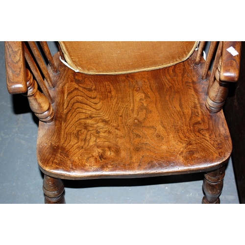 14 - Antique elm seated high backed country armchair