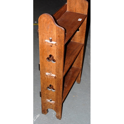 18 - A vintage Oak bookcase with trefoil cutouts