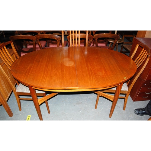 194 - A retro dining table and 6 chairs - G-Plan style