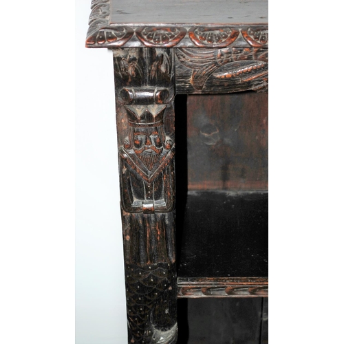 216 - Carved antique oak bookcase