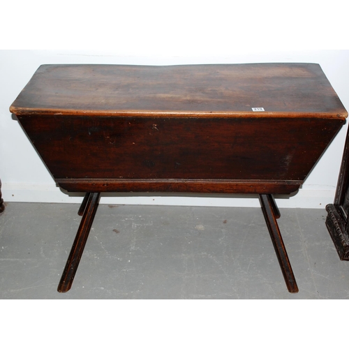 219 - An antique Elm planked dough bin on legs - probably 18th century