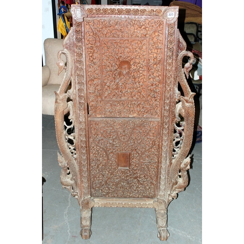 223 - An antique Anglo Indian carved wooden fire screen