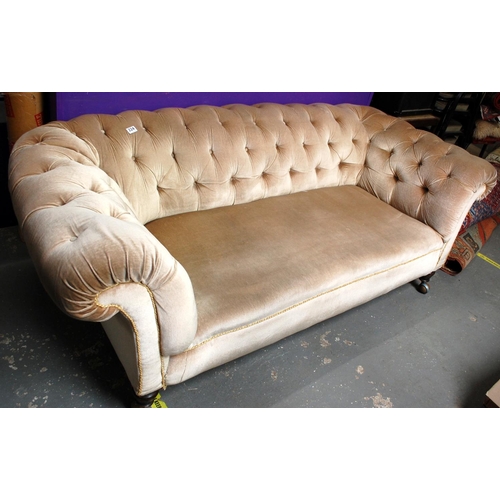 224 - An antique Chesterfield sofa