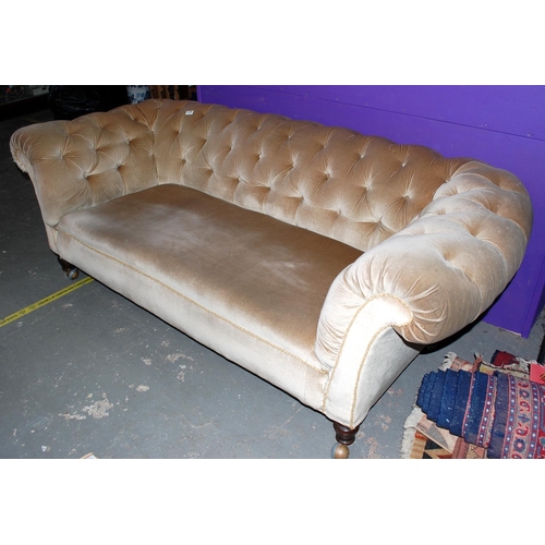 224 - An antique Chesterfield sofa