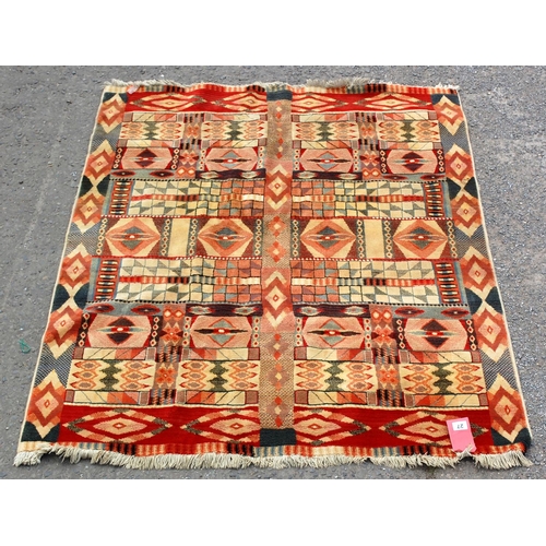 27 - A flatweave rug with angular design