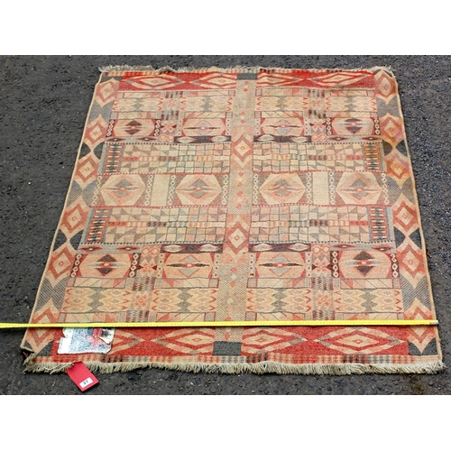 27 - A flatweave rug with angular design