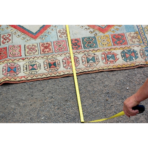 29 - A vintage medallion rug