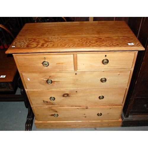 3 - A 2 over 3 Victorian pine chest of drawers