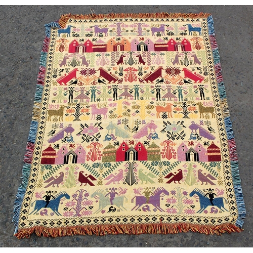 37 - An unusual reversible flatweave rug decorated with animals and people etc