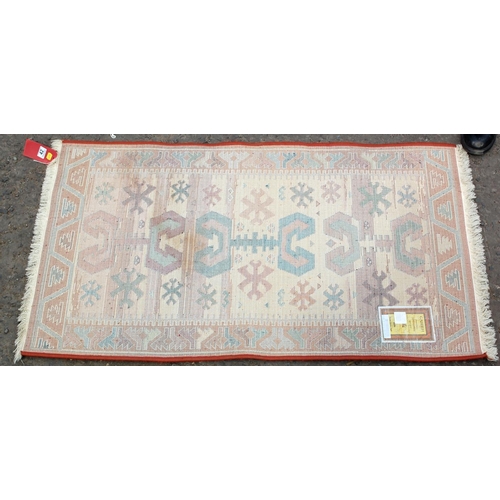 42 - A small Gabbeh rug with abstract designs