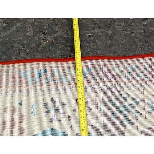 42 - A small Gabbeh rug with abstract designs