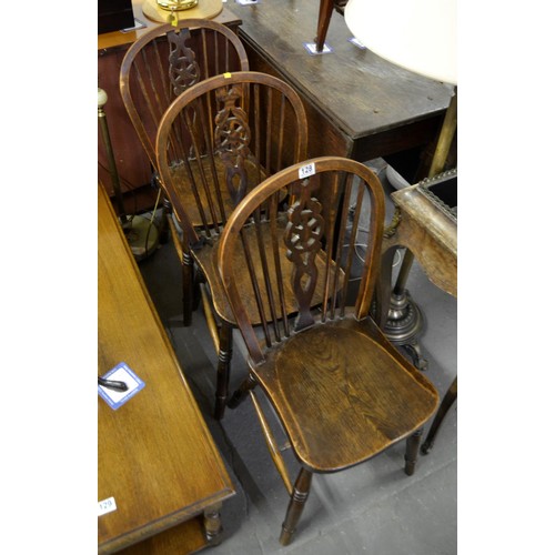 128 - 3 antique Elm seated wheel back chairs