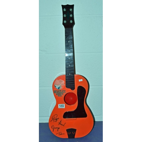 1452 - A vintage Beatles BIG 6 toy guitar - Postage/ Packing not available