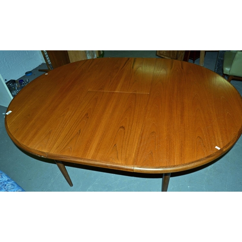 16 - A G-Plan retro extending dining table - Postage/packing not available.