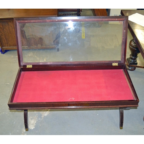 27 - A vintage glass topped bijouterie table - Postage/packing not available.