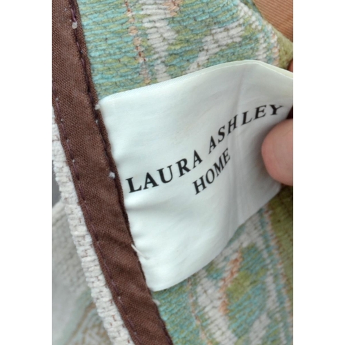 104 - A large light coloured Laura Ashley rug