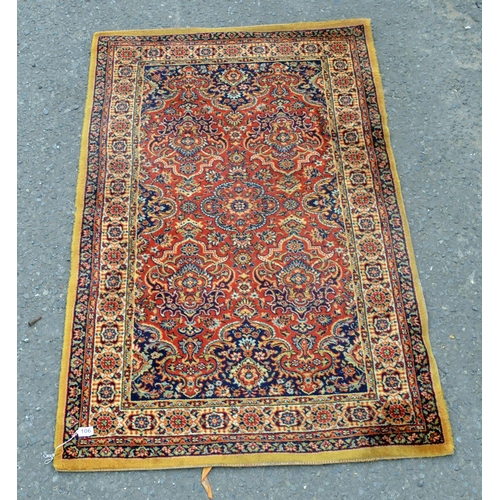 106 - A vintage rug with medallion border - Postage/packing not available.