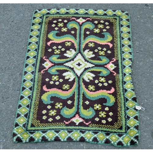 113 - A green ground thick pile wool rug