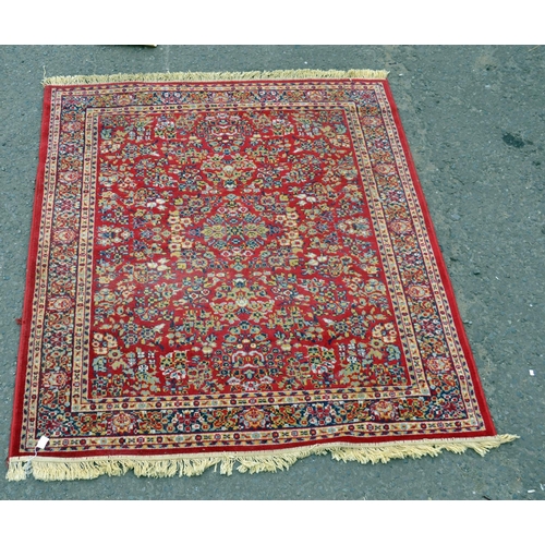 118 - A large red ground rug with Herati border - Postage/packing not available.