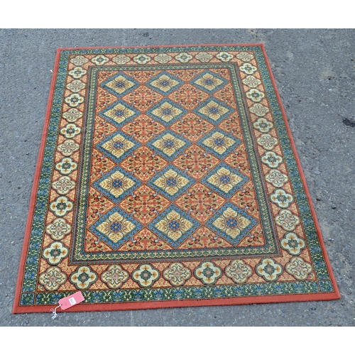 119 - A geometric designed rug - Postage/packing not available.