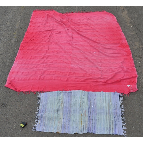 124 - Pink blanket or throw and a small rug