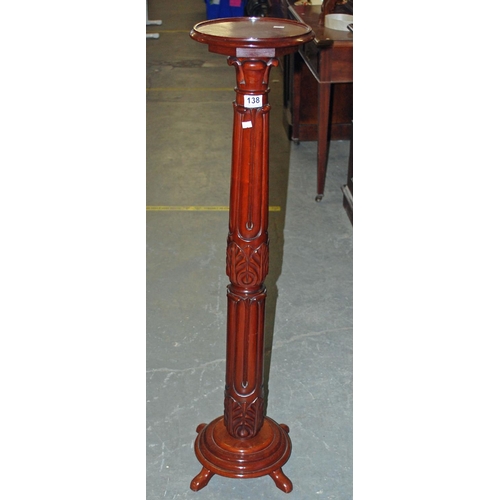 138 - Carved mahogany torchere stand - Postage/packing not available.