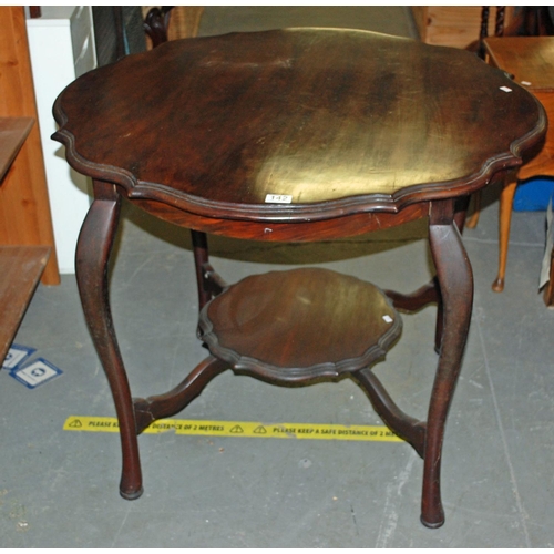 142 - Edwardian Mahogany side table - Postage/packing not available.