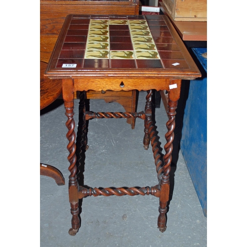 157 - An Art Nouveau tile topped side table - Postage/packing not available.