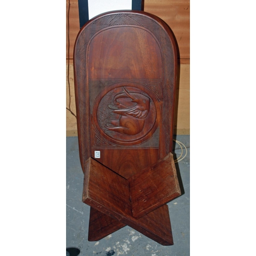 213 - Carved African hardwood table - Postage/packing not available.